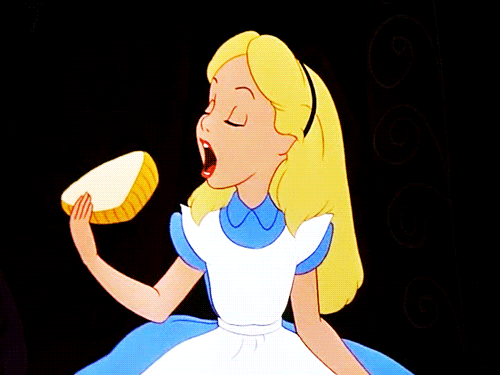 Alice-Eats-a-Slice-Of-Bread-In-Alice-In-