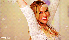 Hilary-Duff-Smiling-Spinning-With-Bubbles.gif