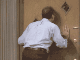 Al-Bundy-Waits-Impatiently-By-The-Door-On-Married-With-Children.gif