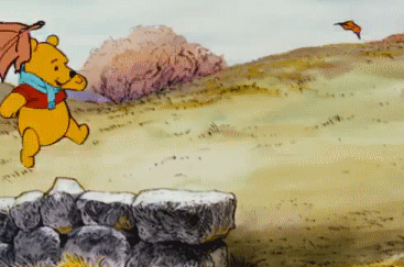 Winnie-The-Pooh-Playing-With-The-Autumn-