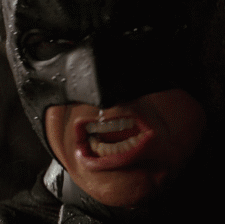 Batman-Pushes-Through-The-Pain-In-The-Rain-In-The-Dark-Knight.gif