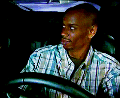Dave-Chappelle-Looks-With-Disgust-As-He-Drives-Around-Town.gif