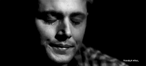 Dean-Winchester-Wipping-The-Tears-Away-In-Black-White-Gif.gif