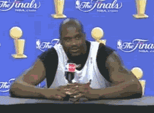 Shaquille-ONeal-Laughing-Pointing-As-He-Leaves-The-Scene-Of-The-Interview.gif