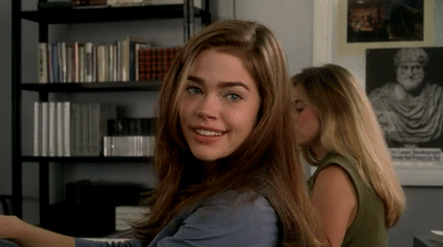 Denise-Richards-Blows-A-Kiss-In-Class-On-Starship-Troopers.gif