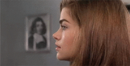 Pretty-Denise-Richards-Turns-Smiles-In-Starship-Troopers.gif