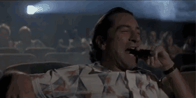 Robert-DeNiro-Laughing-Hysterically-In-a-Movie-Theather-In-Cape-Fear.gif