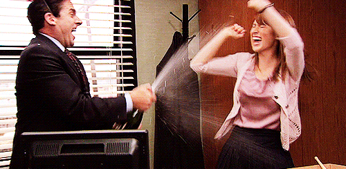 Steve-Carell-Ellie-Kemper-Pop-Champagne-For-To-Celebrate-The-New-Year-.gif