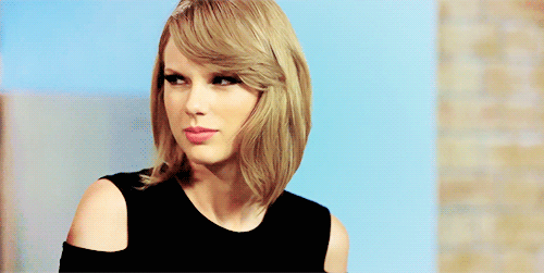 Taylor-Swift-Gives-a-Mean-Snarky-Look-To-All-The-Jerks.gif