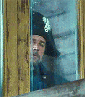 Javert-Looks-Through-The-Window-Observing-In-Les-Miserables.gif