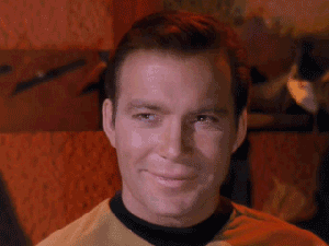 William-Shatner-Smiles-and-Nods-As-Captain-Kirk-On-Star-Trek.gif