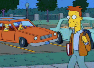 Homer-Simpson-Yells-At-a-Nerdy-Student-As-Marge-Parks-The-Car.gif