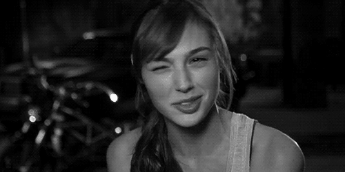 http://mrwgifs.com/wp-content/uploads/2013/07/Gal-Gadot-Sexy-Wink-and-Smile.gif