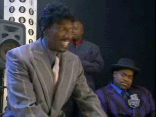 Charlie-Murphy-Laughing-At-Prince-On-The-Chappelle-Show.gif