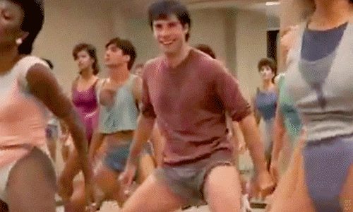 90s-Work-Out-Video-WIth-Some-Happy-Pelvic-Thrusting-While-Smiling.gif