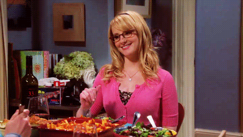 Bernadette-Smiling-and-Eating-Her-Dinner-With-Howard-On-The-Big-Bang-Theory