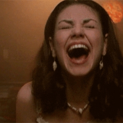 Mila-Kunis-As-Jackie-Burkhart-Laughing-Hysterically-In-The-Circle-On-That-70s-Show_408x408.jpg